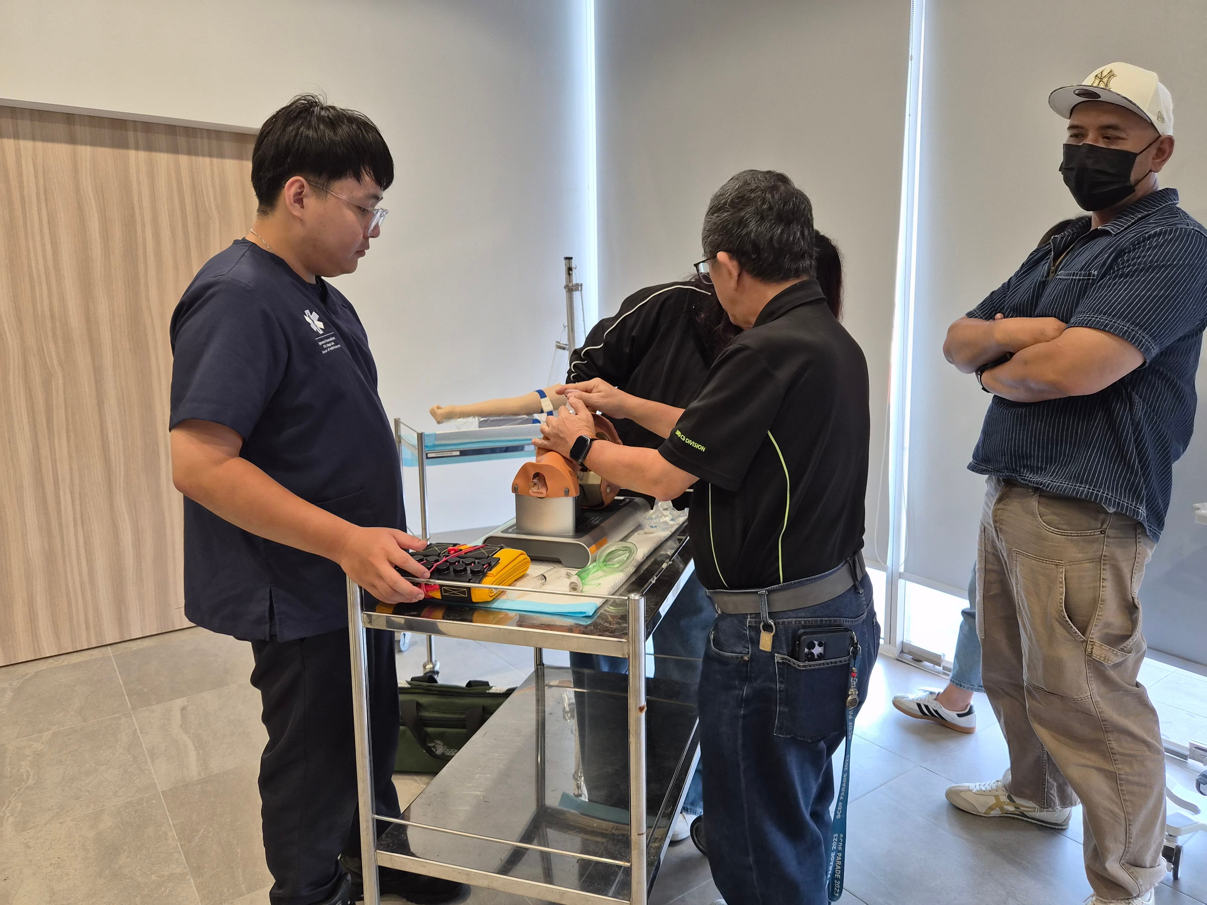 Participants practicing airway insertion